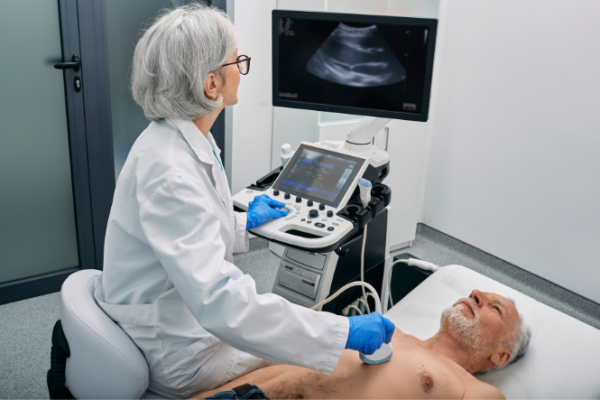 Man having echocardiogram