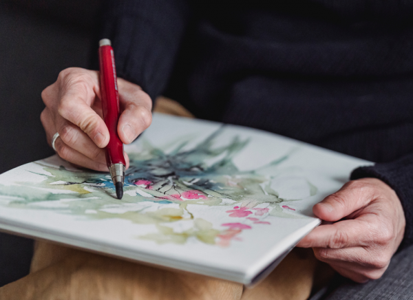 Woman doing a watercolour painting 