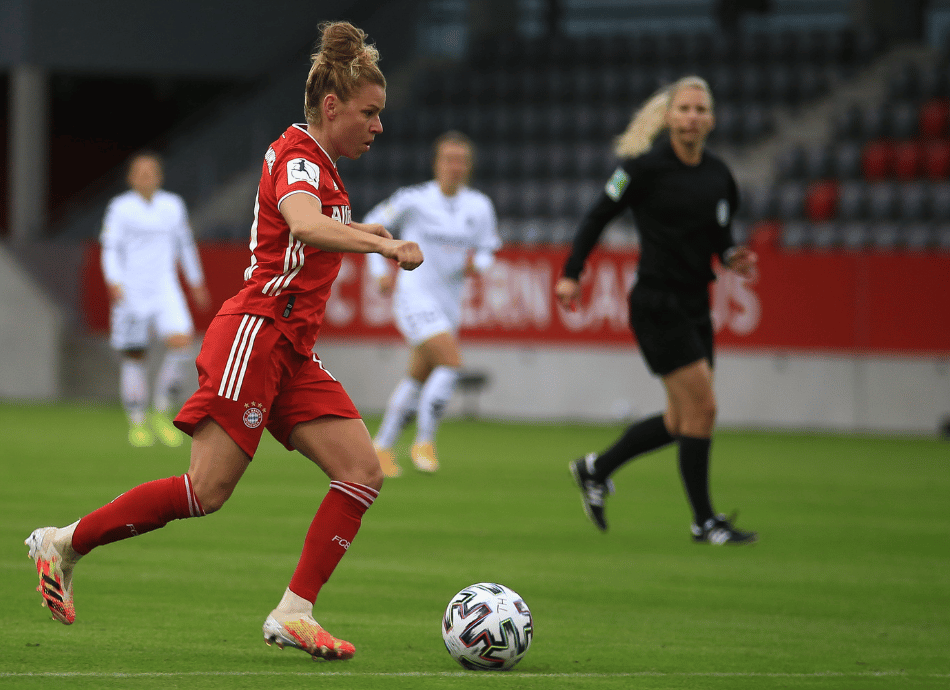 Young woman playing football