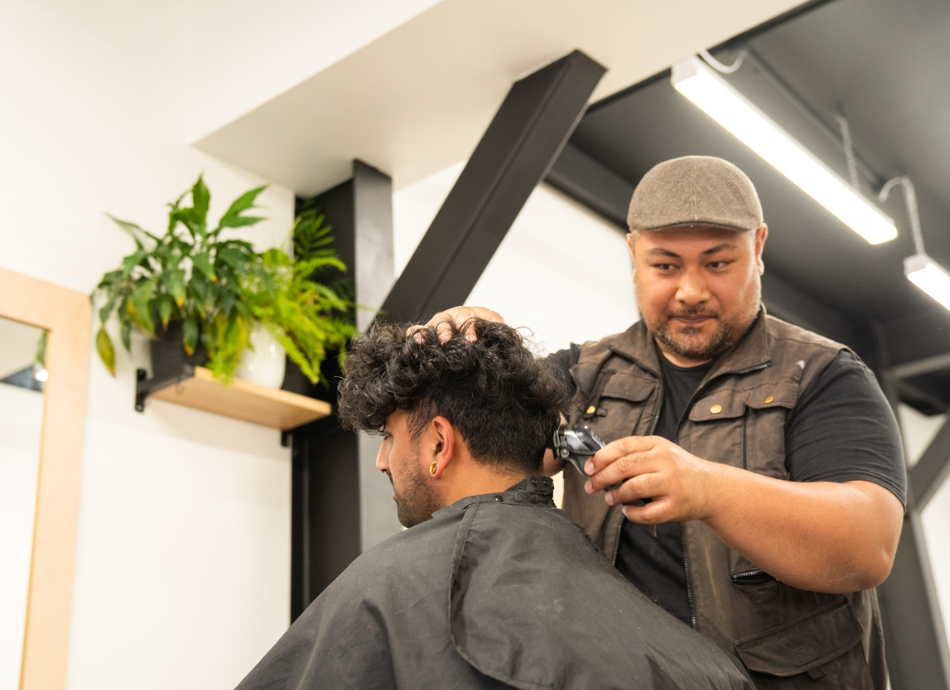 Barber cutting hair 