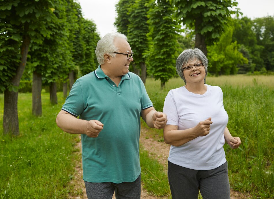 Older couple walking outside