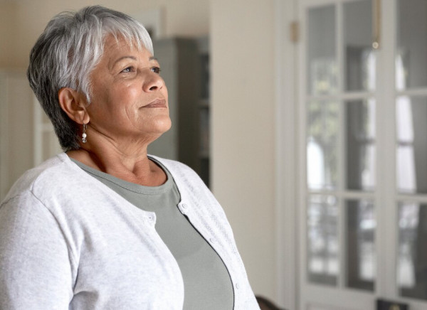 Woman focusing on her breathing and sensations